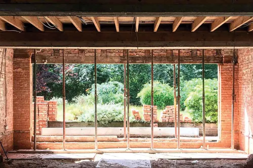 Looking beyond the bare brick to plan an entertaining space with outdoor kitchen and terrace at The Courthouse.