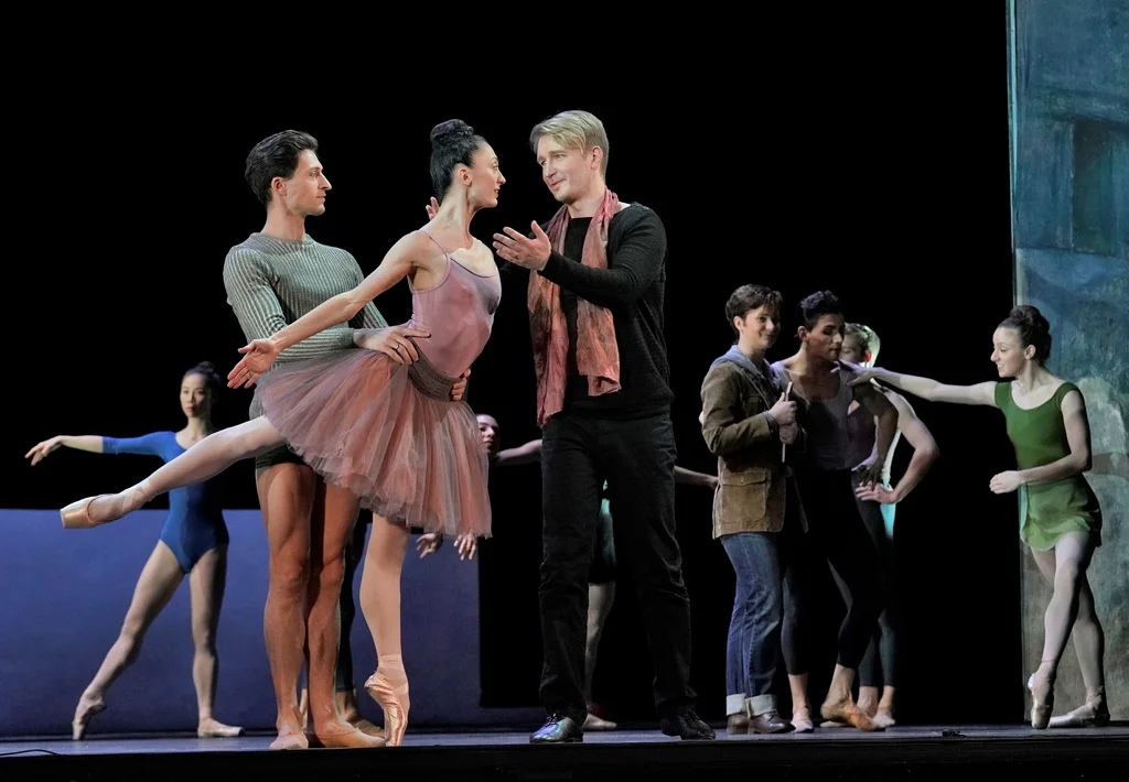 Tenor Maxim Mironov (in black) as Orpheus, with Temur Suluashvili and Victoria Jaiani from the Joffrey Ballet