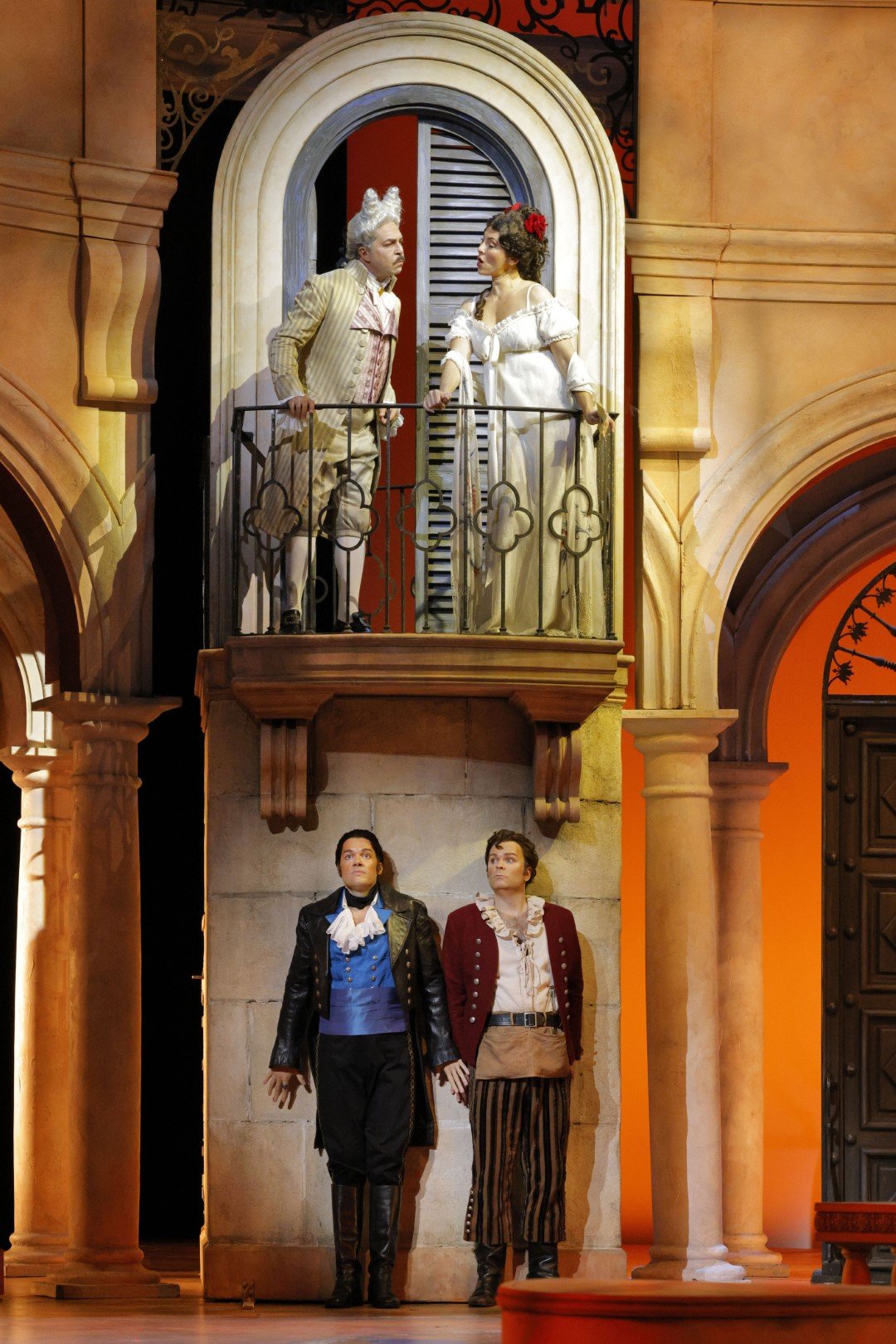    Clockwise from top left: Paolo Bordogna (Dr. Bartolo), Isabel Leonard (Rosina), Joshua Hopkins (Figaro) and Edgardo Rocha (Count Almaviva) in LA Opera's 2023 production of "The Barber of Seville."   