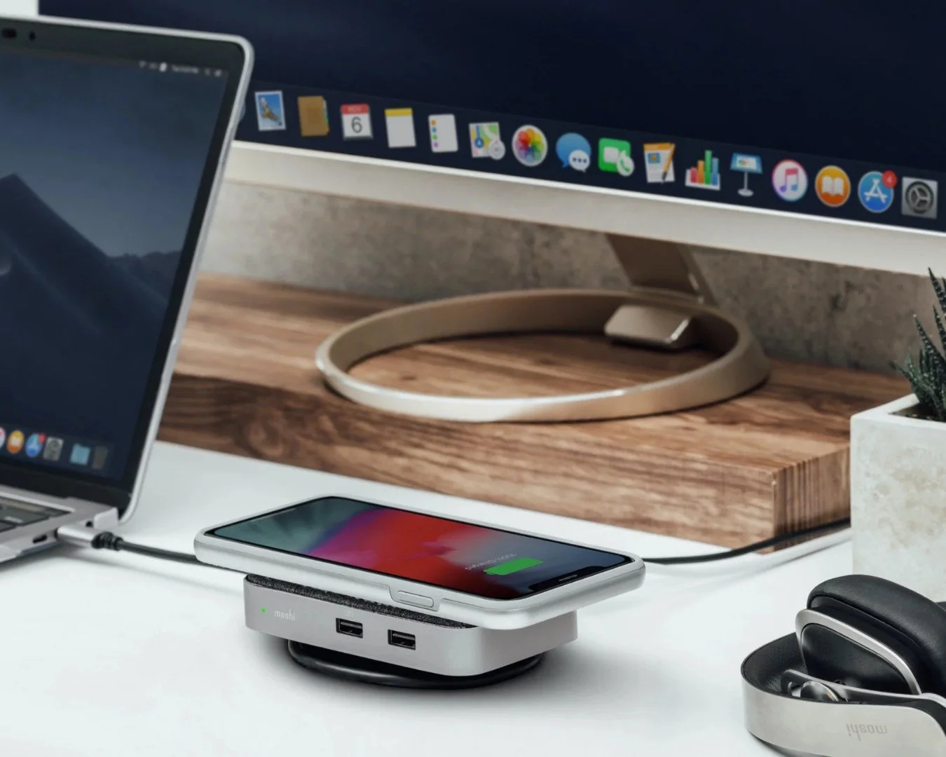 The Moshi Symbus Q is one of those accessories that just makes your desk setup easier. Plug in your Mac, connect your essentials, and drop your phone on top to charge &mdash; all in one spot.

We also carry plenty of other Moshi accessories at GeekHa