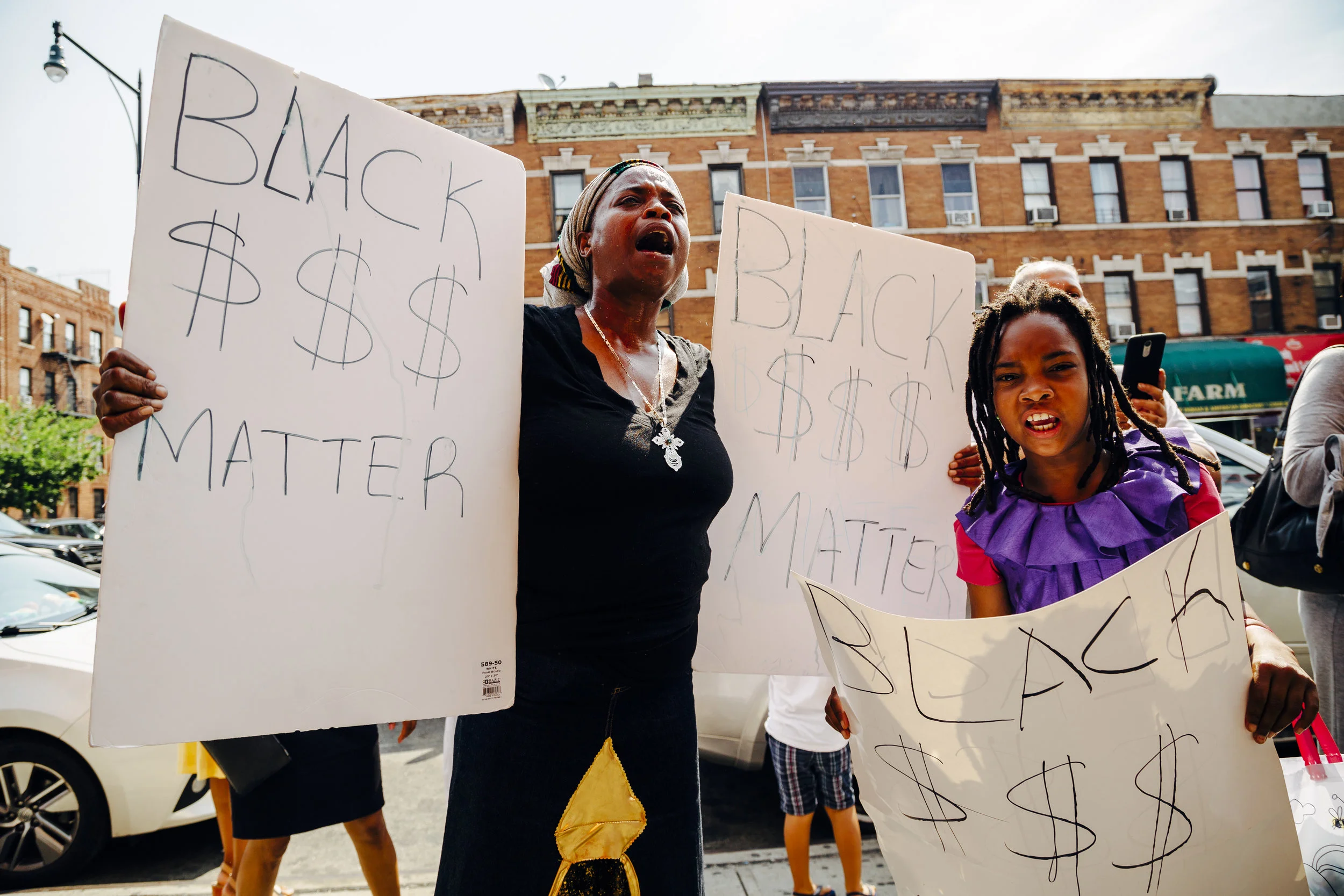 broomstick beating protest East Flatbush