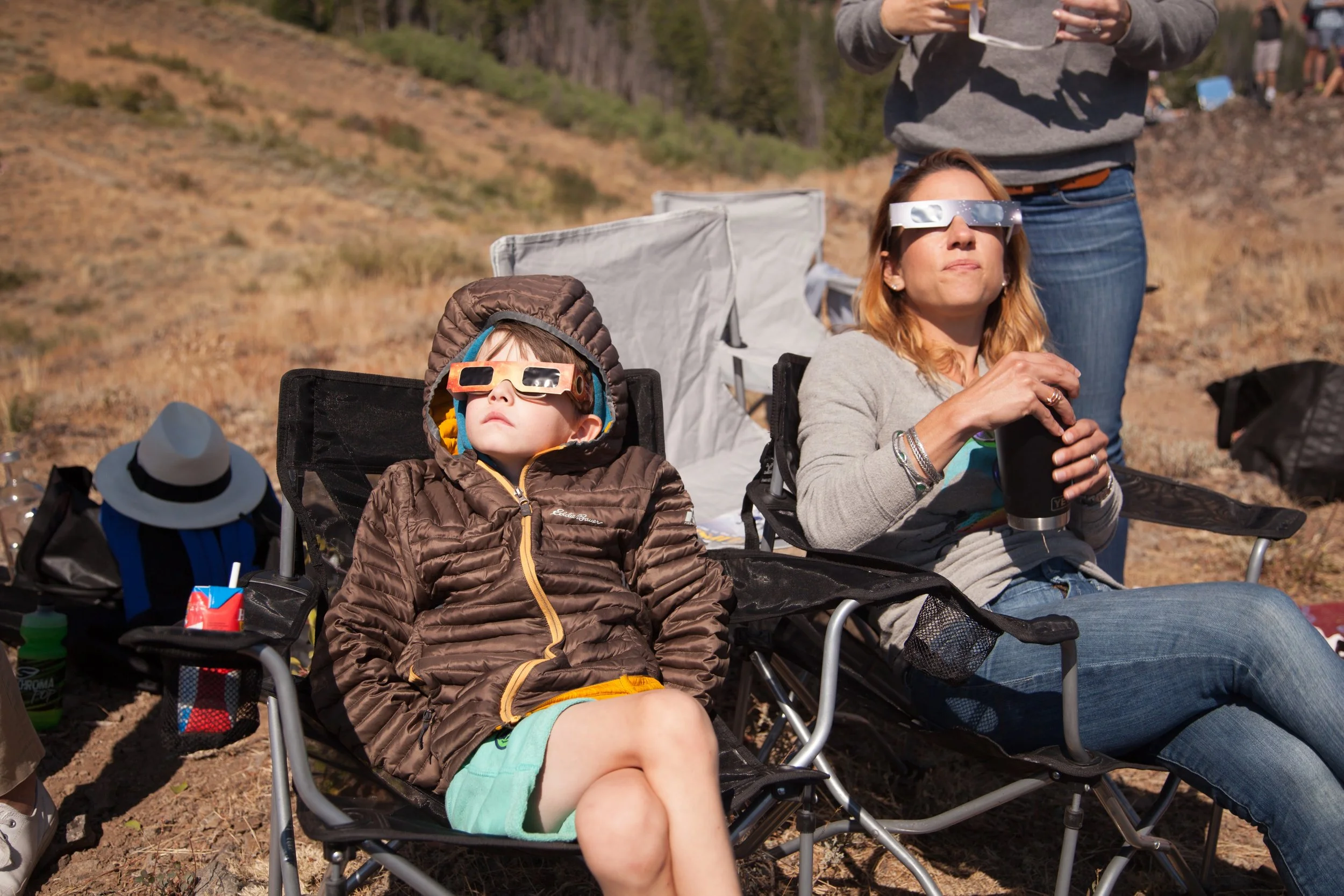 Temperatures dropped fast, Dries and Ashley watching the partial eclipse. Photo by Matthew Clark.