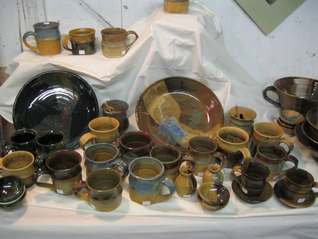 Stoneware Muddslinger Pots on display . . . .