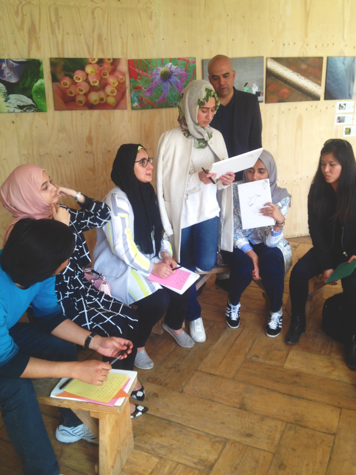 Students from Quatar campus presenting their pieces from the Free Fall writing exercise. 