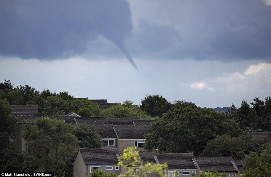A funnel cloud over Cornwall, first stage of making a tornado