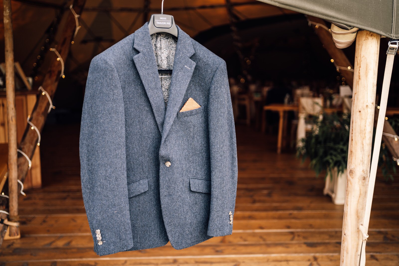 groom suit details at hidden hive wedding venue