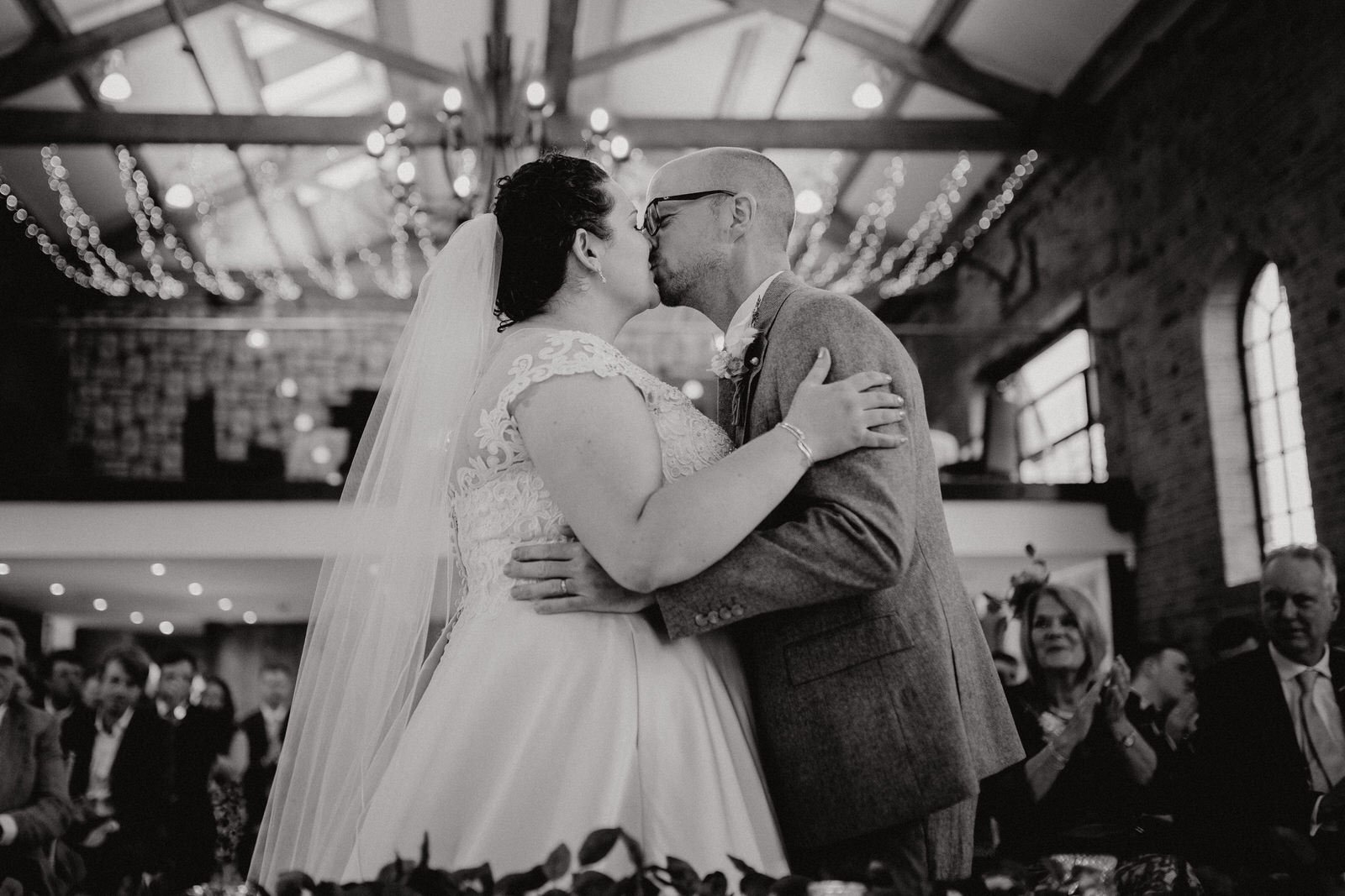 first kiss during wedding ceremony at the carriage hall, nottingham
