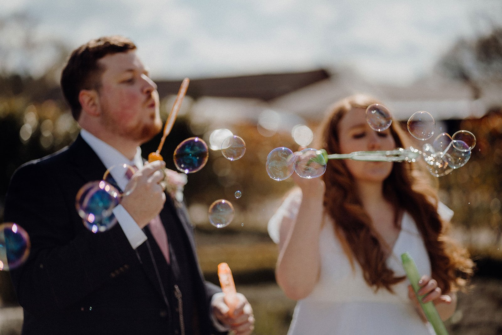 bride and groom blow bubbles goosedale wedding