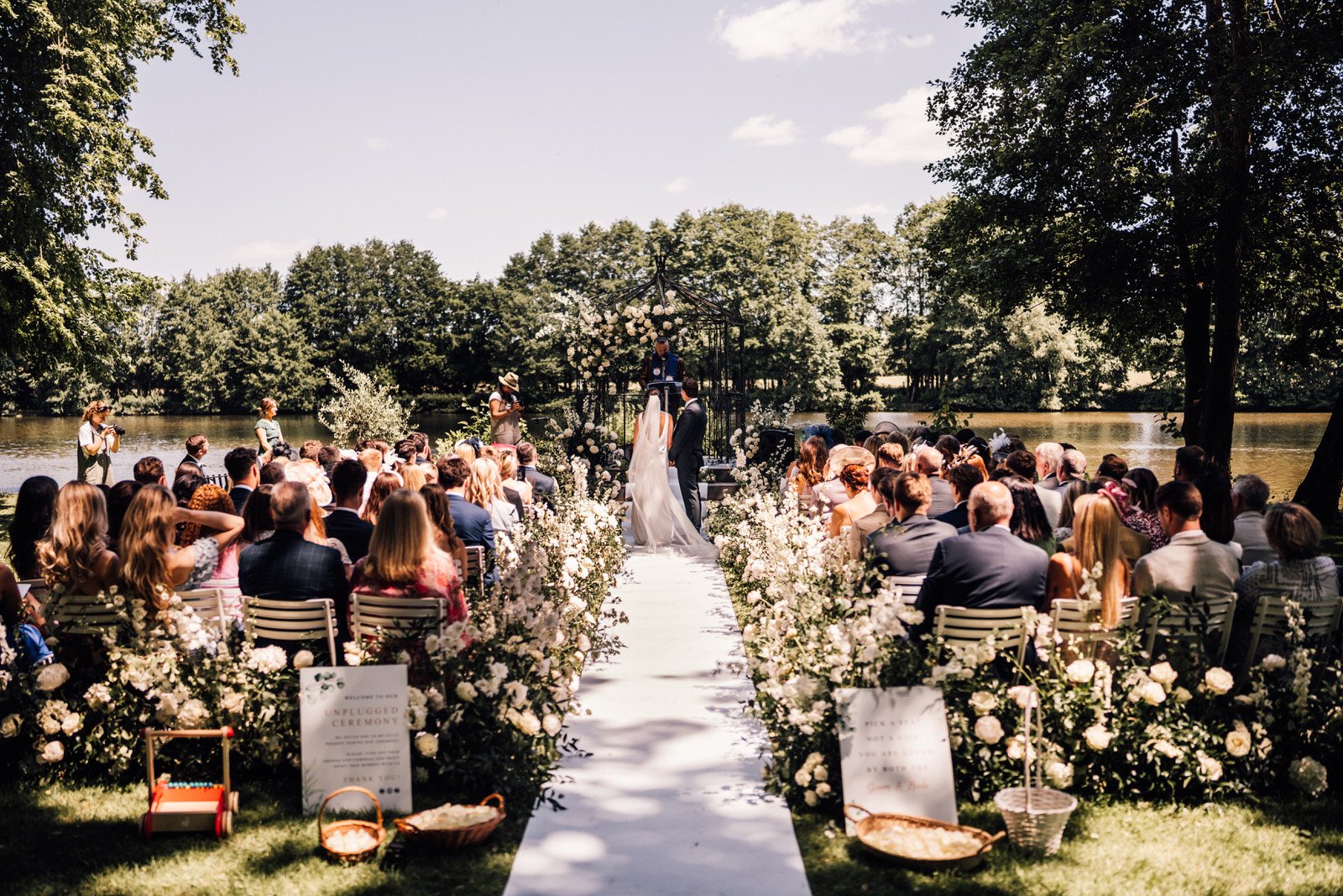 wedding ceremony by lake Chateau allure du lac