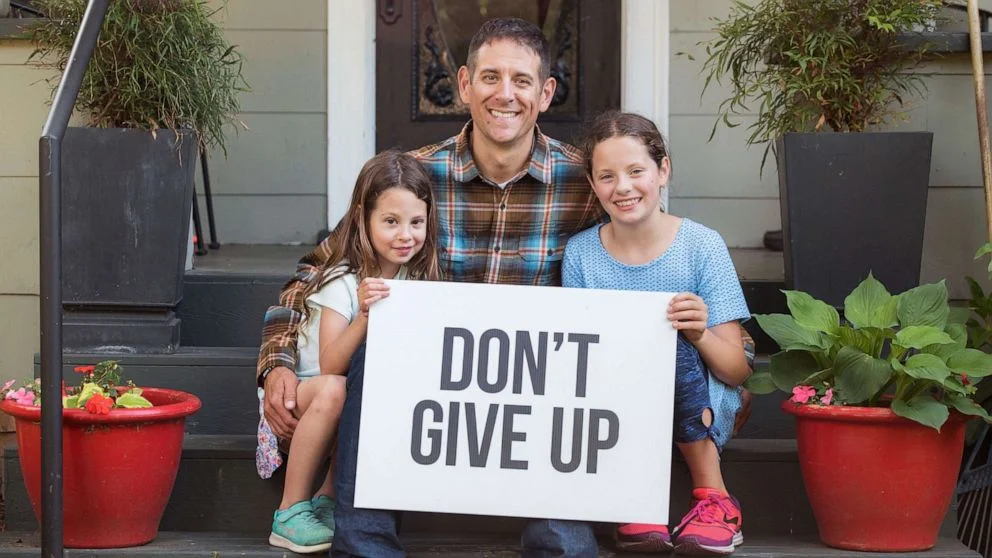 Colby Wallace poses with his two daughters, Caelyn and Chloey in an undated photo.