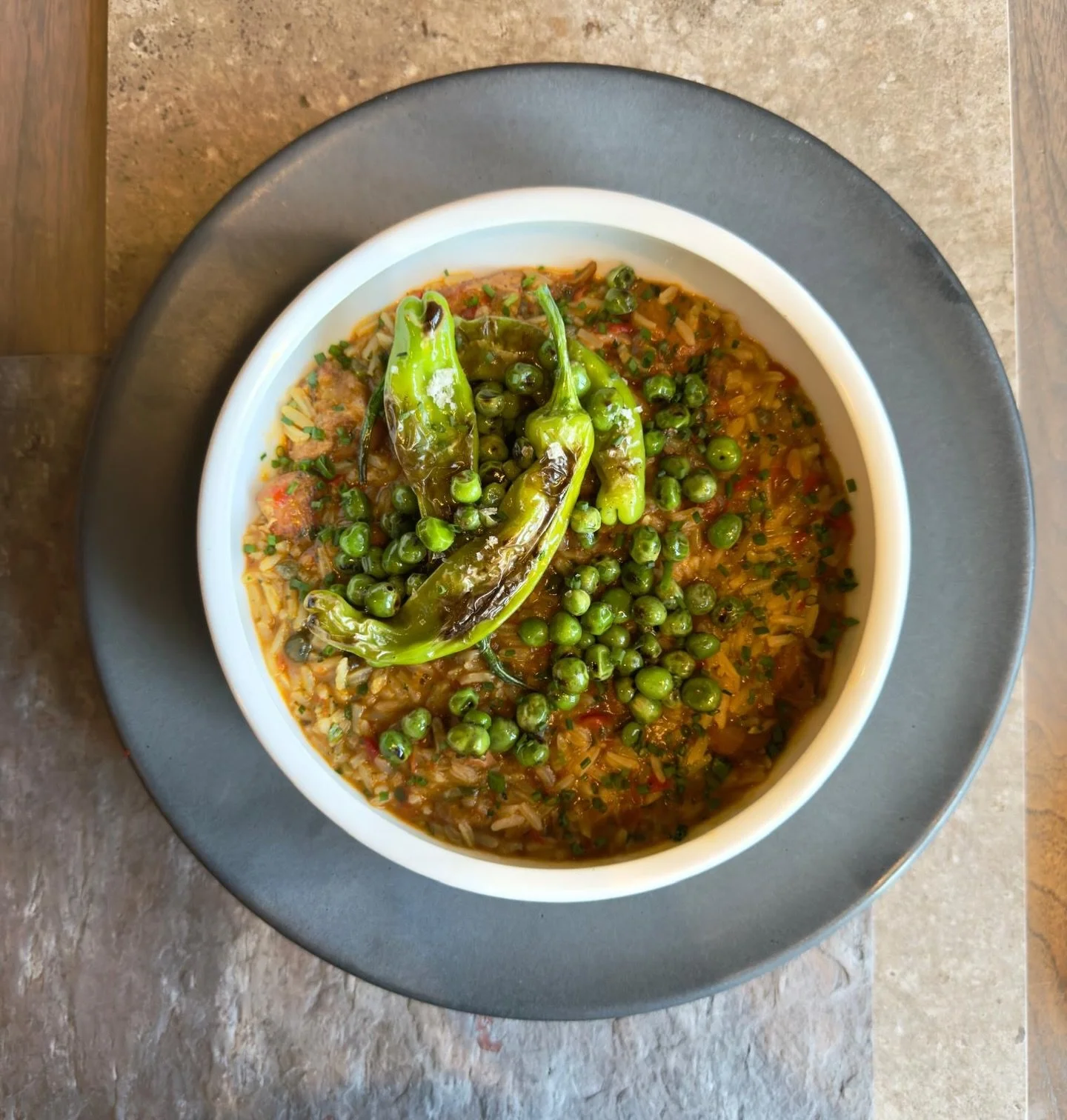 Discover the Pelao, a traditional Venezuelan rice dish in Baltimore.
 At Alma Cocina Latina, we bring this beloved comfort food to life with slow toasted rice, rich braised flavors, sweet green peas, and blistered peppers.
Deeply rooted in Venezuelan