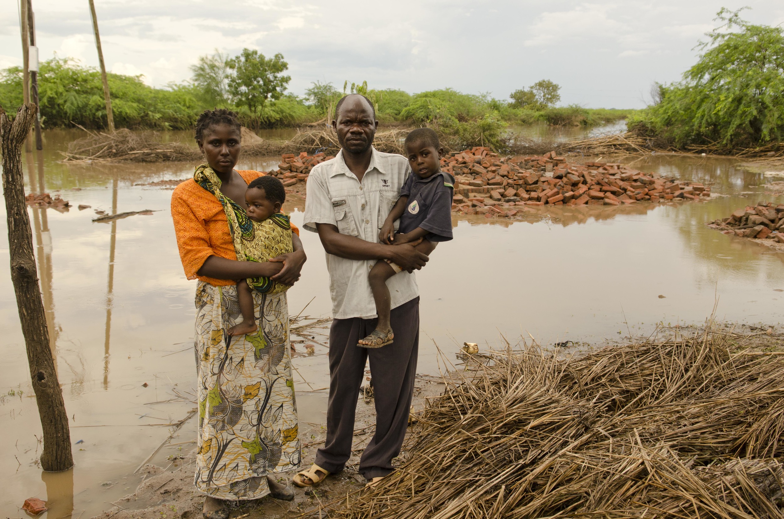 The Damiano family - Tamara, Caroline, Matthews and Precious - in front of what's left of their home in the southern Malawi district of Chikwawa.