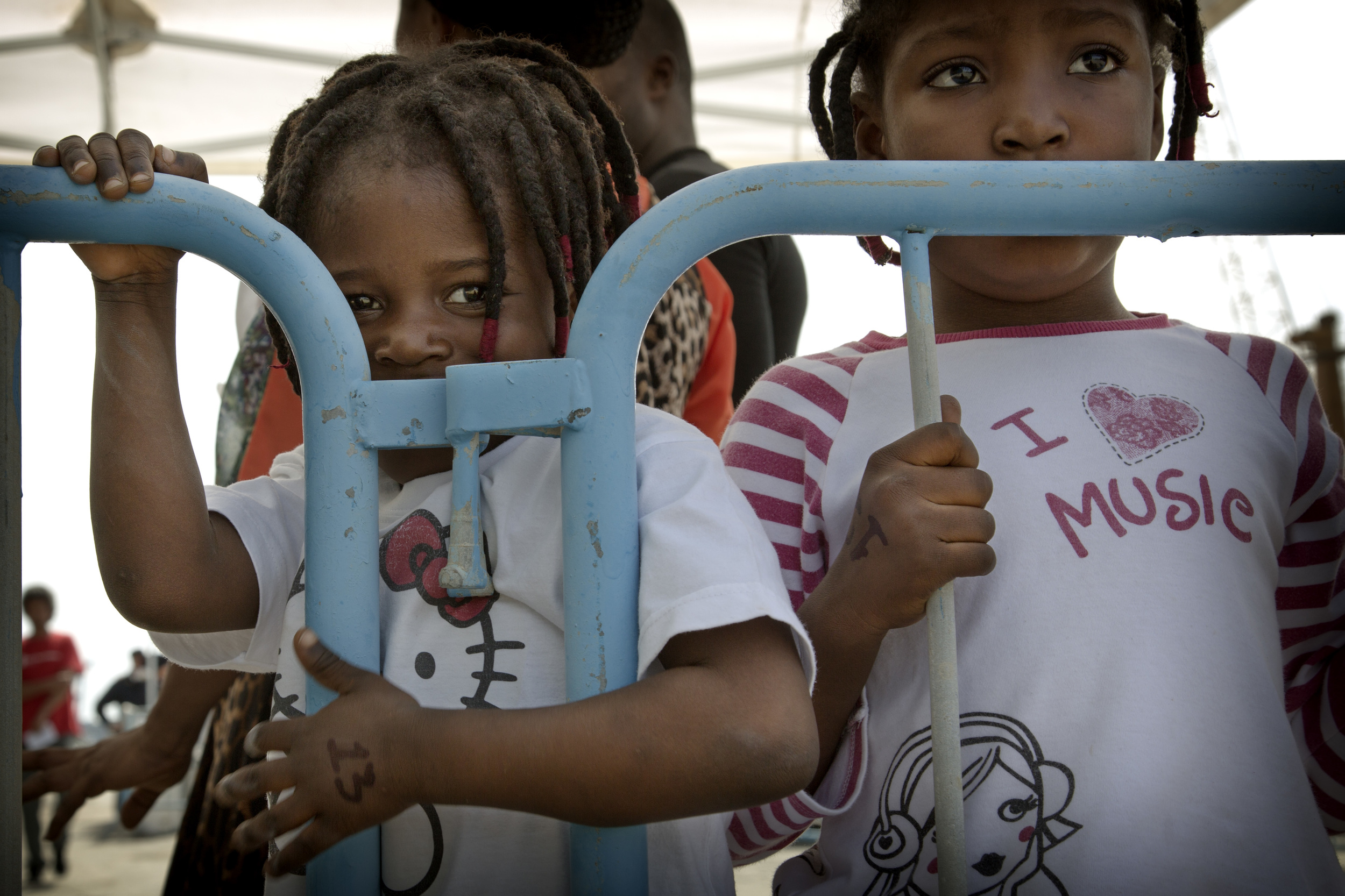 Bebe Mafedor, 5, and her seven-year-old sister, Kinsola Adabajo on the quay.