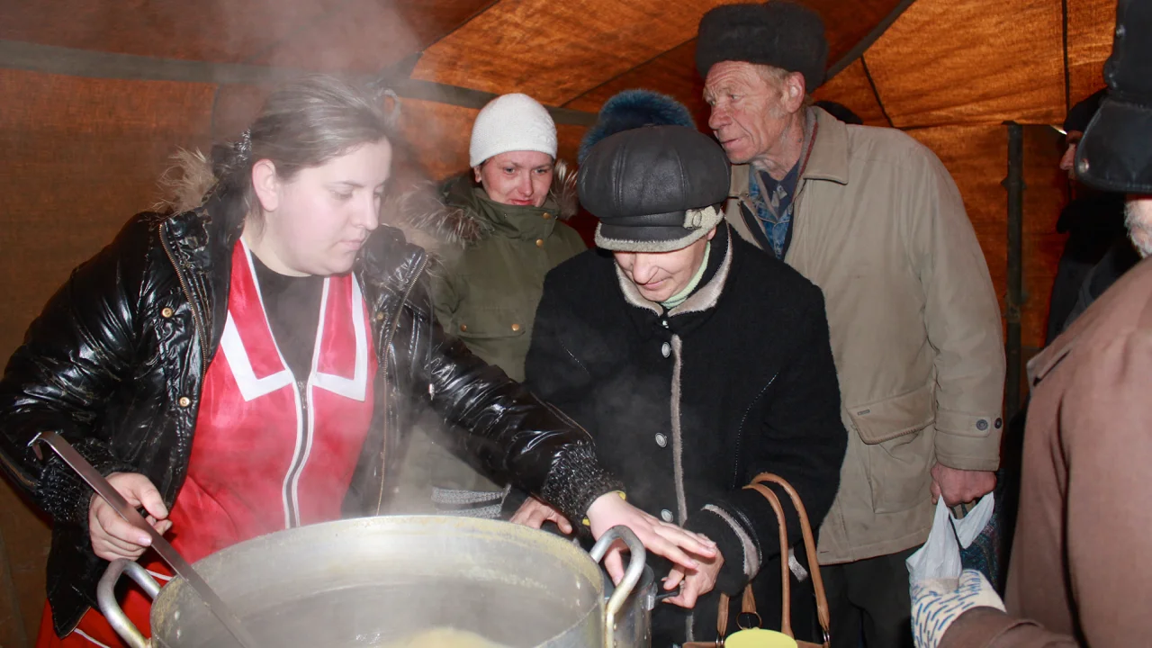 Soup kitchens, like this one run by the local Red Cross in Luhansk, are the only source of regular food for some 