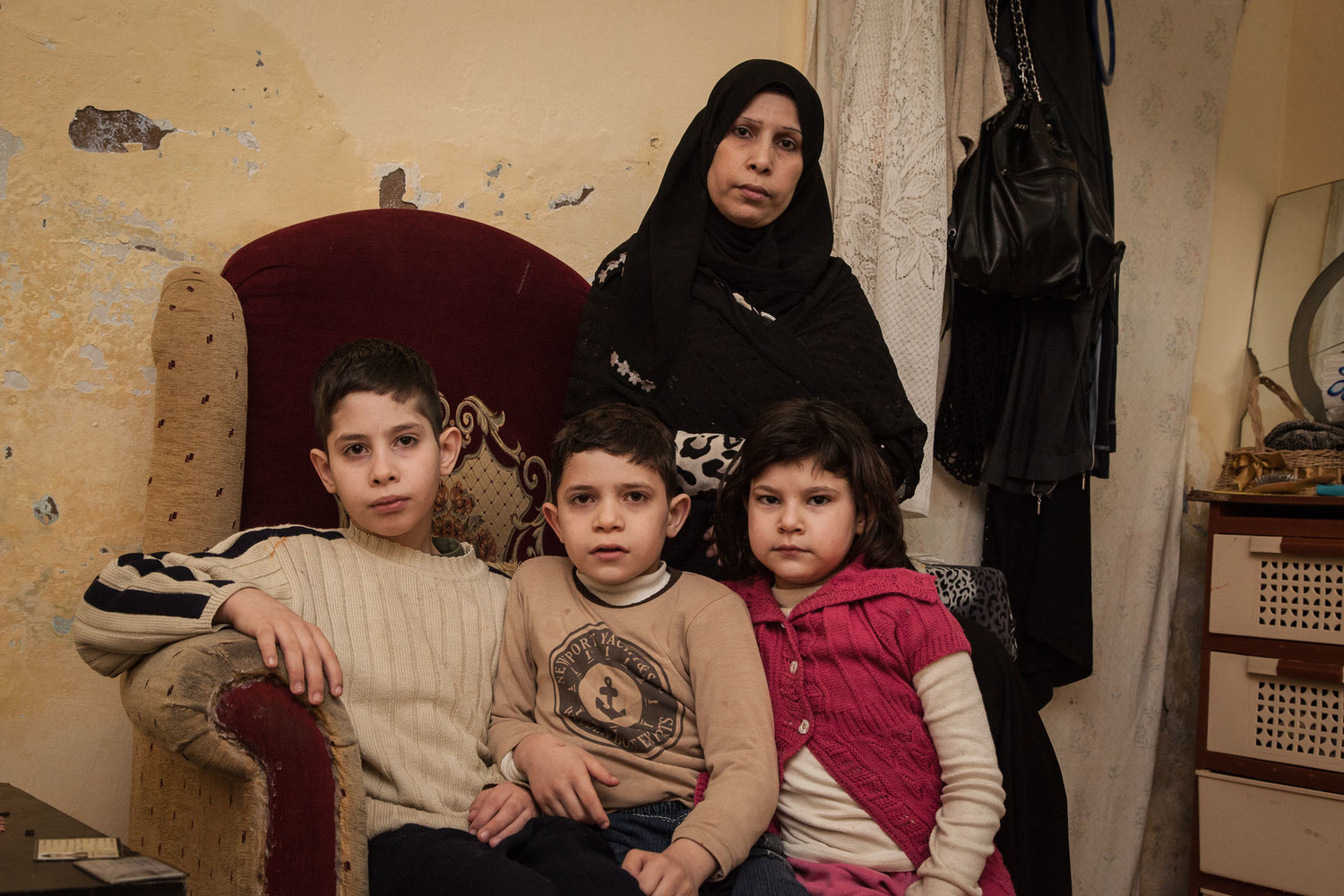 Ahmed al-Qaed a laissé derrière lui sa femme Amal et leurs trois enfants, Mahmood, Omran et Raghed