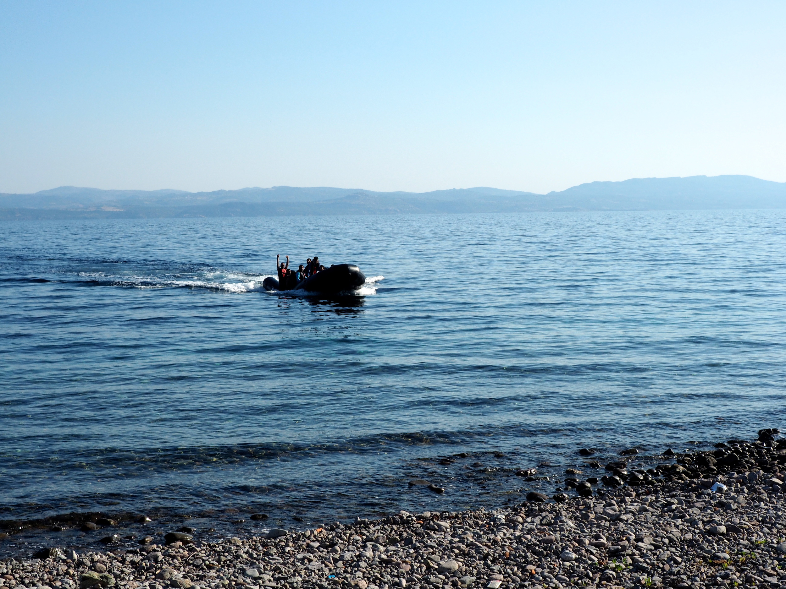 A rubber dinghy carrying migrants approaches the shore at Skala Sykaminias. The sea route from Turkey to Greece is increasingly popular, perhaps because only 31 migrants have died attempting it so far this year compared to the 1,800 who have died trying to reach Italy by boat from Libya. 