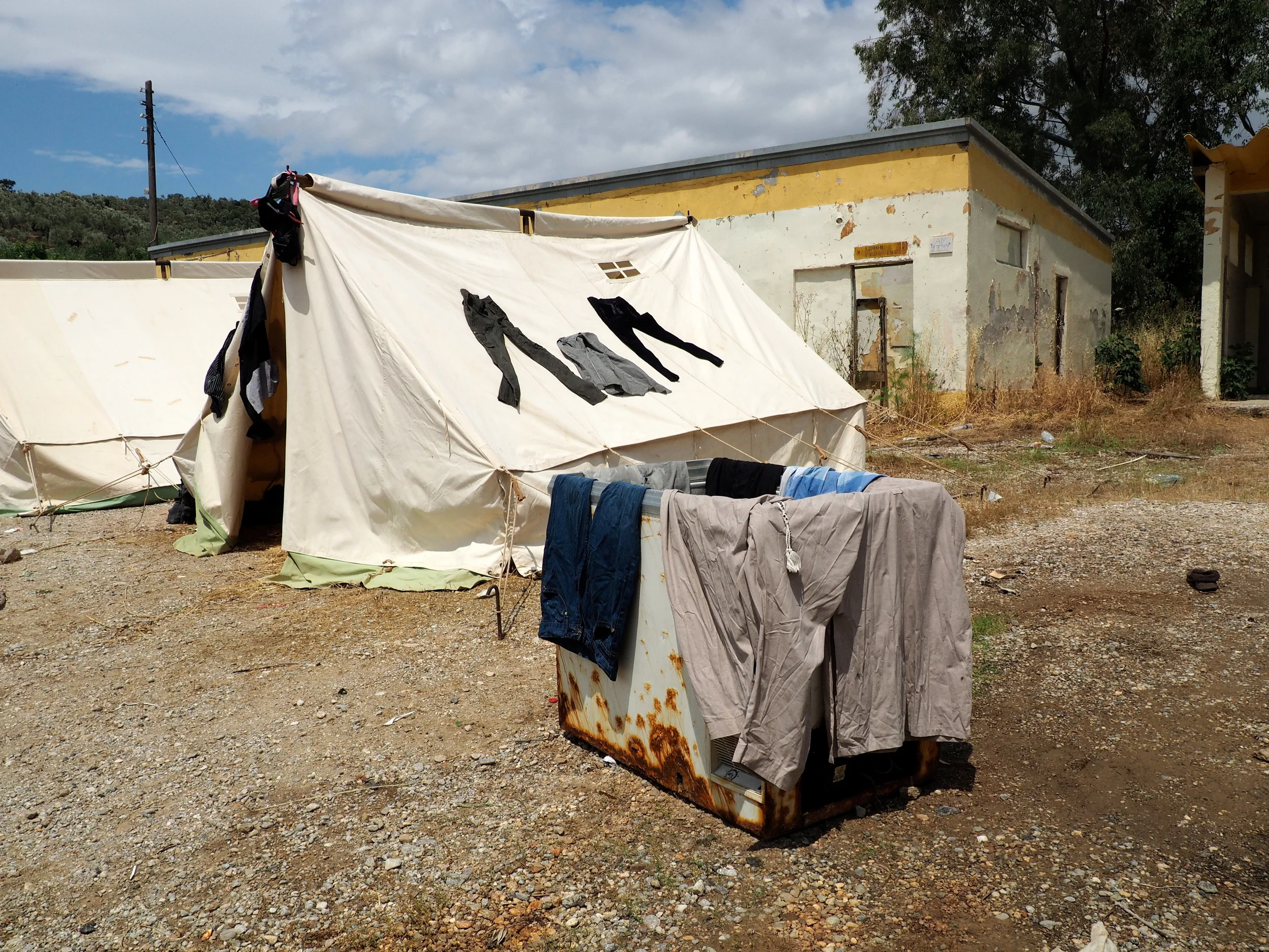 About 1,000 people are currently staying in tents outside the detention centre which has reached capacity