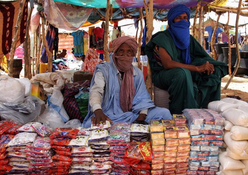  Khalifa Ould Mohamed Lemine (left) sells produce with his son