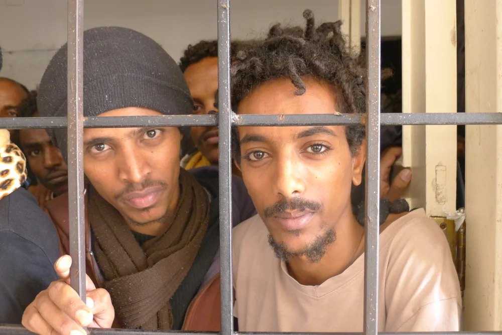 Emanuel and Jonata are held in a Libyan detention centre, they escaped indefinite military conscription in Eritrea.