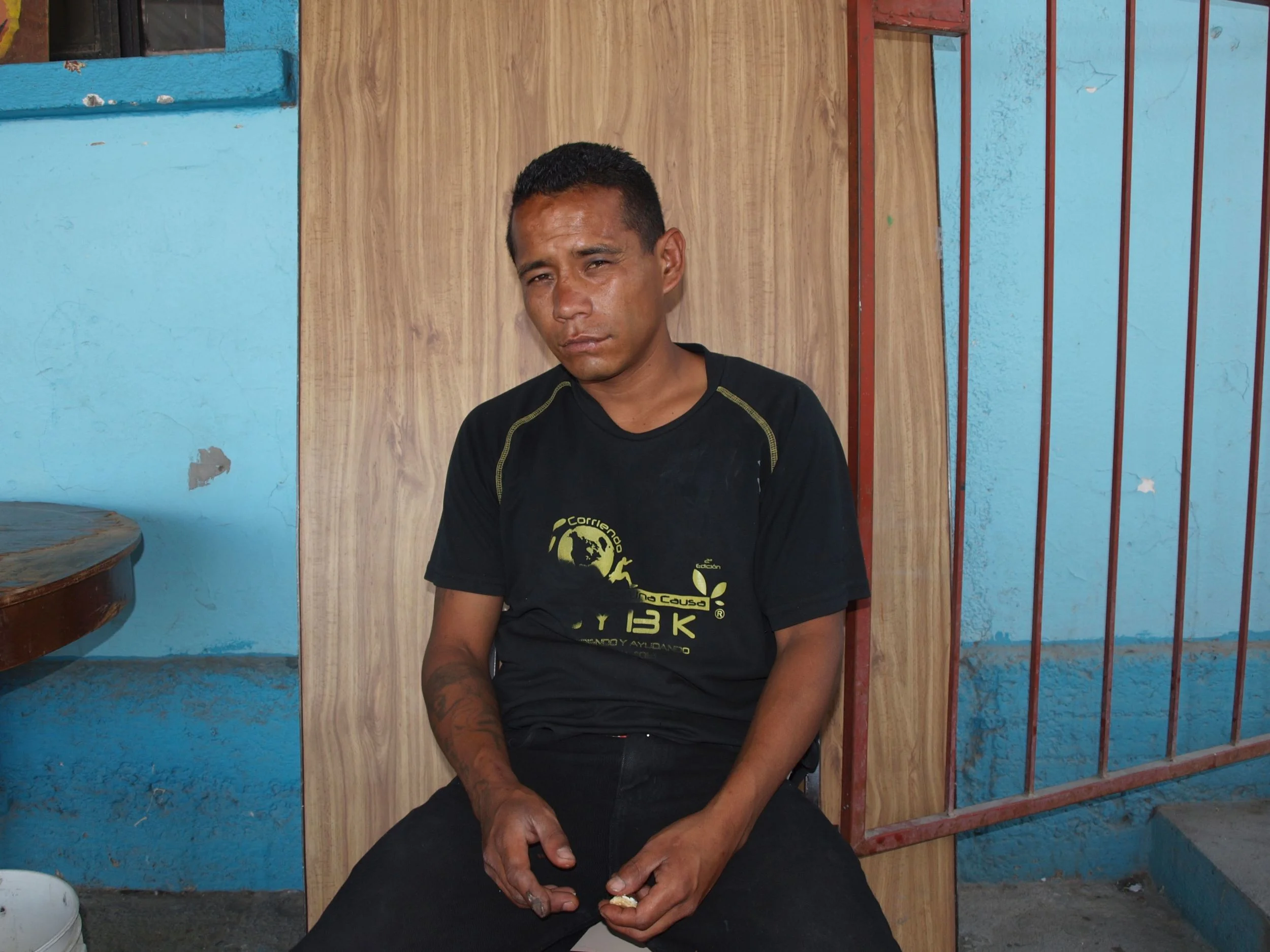 José Noel fell off a train en route to the US and rolled along the track several times. He says his back is injured but he is afraid to go to the hospital.