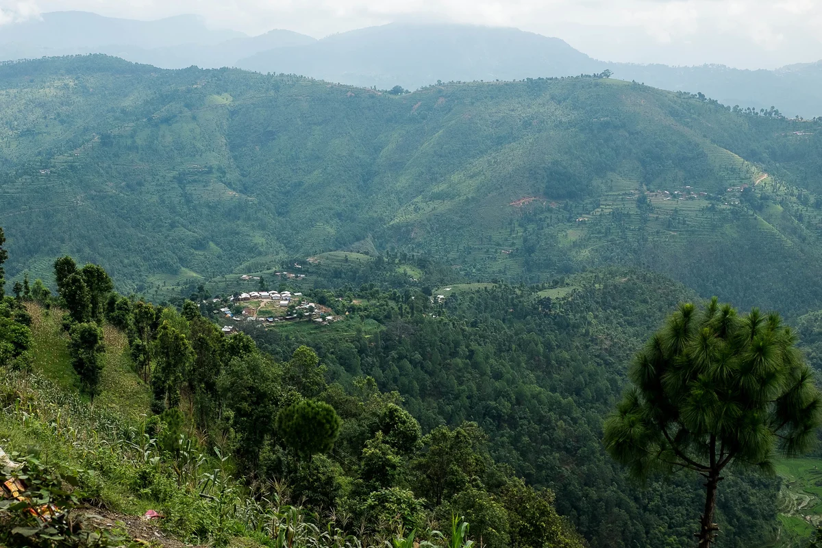 A village destroyed by the earthquake can be seen in the distance on 10 August 2015 in Sindhupalchowk district.