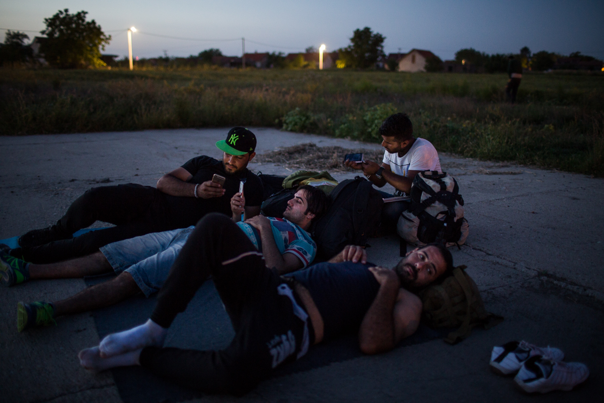 These Iraqis, resting in the village of Tovarnik, arrived recently from Serbia.
