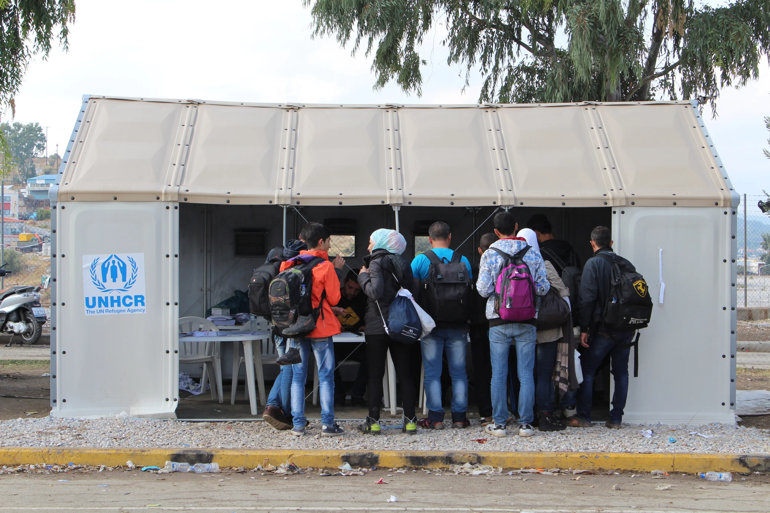Syrians collect their registration papers from the Greek authorities at Kara Tepe camp. Queues here are calm and well managed (Daniel Elkan/IRIN)