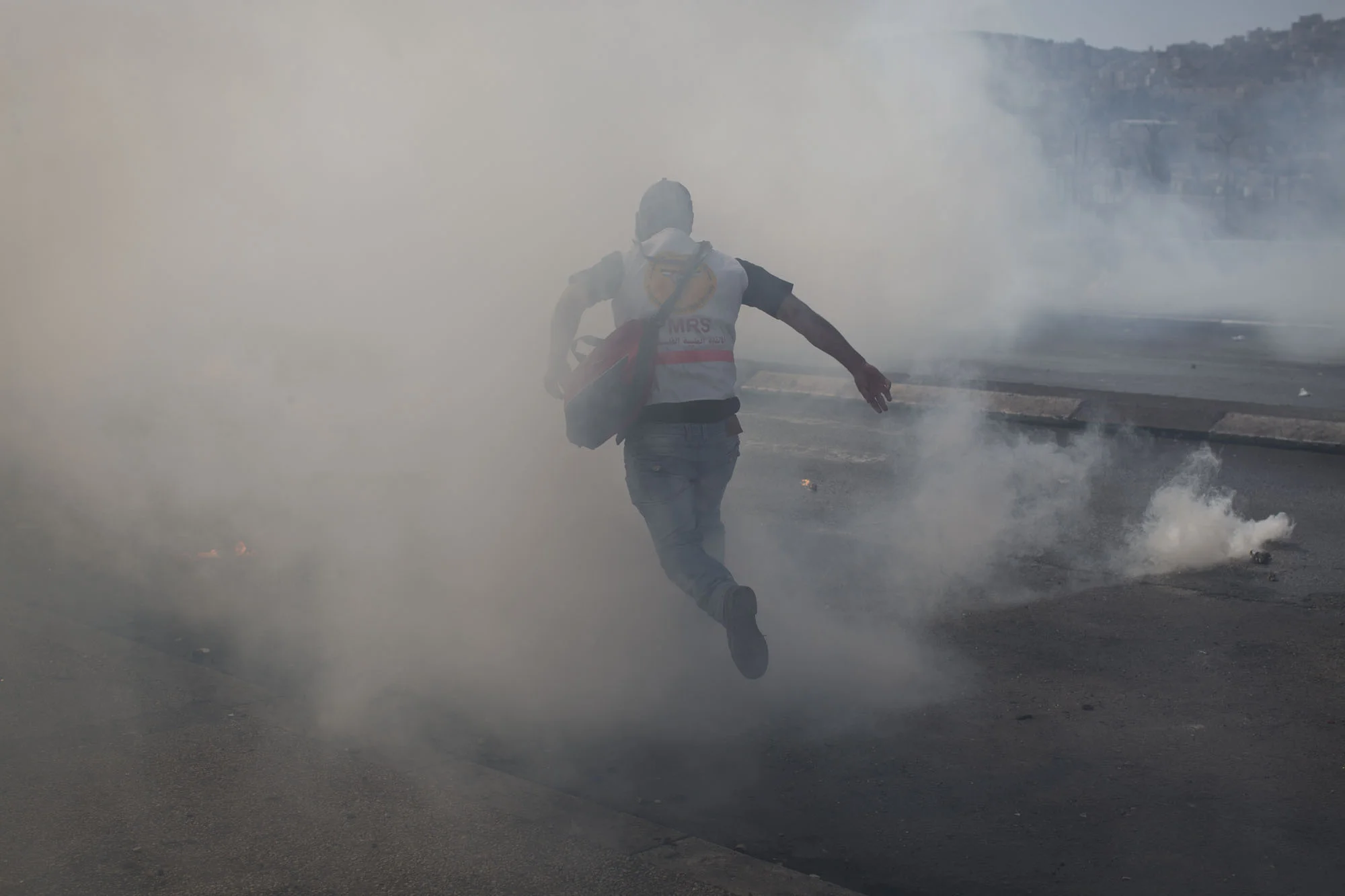 Palestinian first responders work under difficult conditions. They come to clashes prepared with gas masks. Several volunteers have been injured in the line of duty