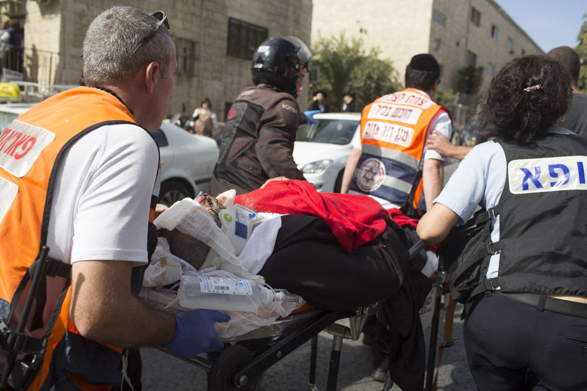 Israeli first responders transport the wounded after an assailant rammed his car into a bus stop in an ultra-Orthodox Jerusalem neighbourhood earlier this week