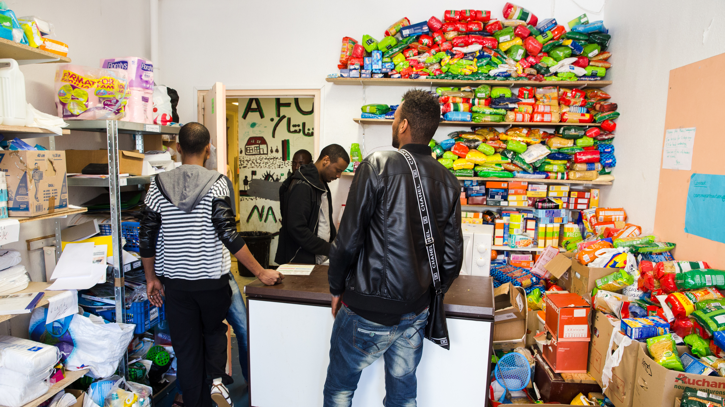 Two ground floor offices have been turned into storerooms. Every day, local residents bring food, clothes and other essential items.