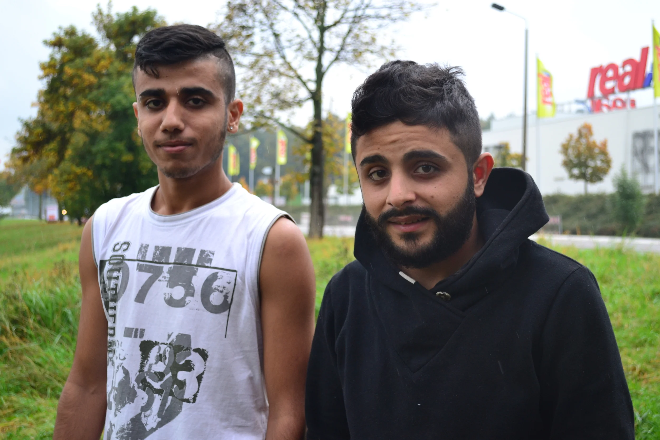 Asmir (left) and his friend, Ahmad, outside the asylum seeker housing in Heidenau (Kristy Siegfried/IRIN)
