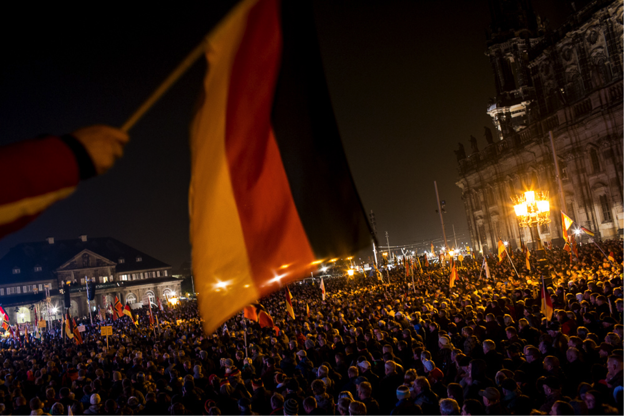 PEGIDA's first anniversary rally in Dresden attracted as many counter-protesters as it did supporters (Andrei Pungovschi/IRIN)