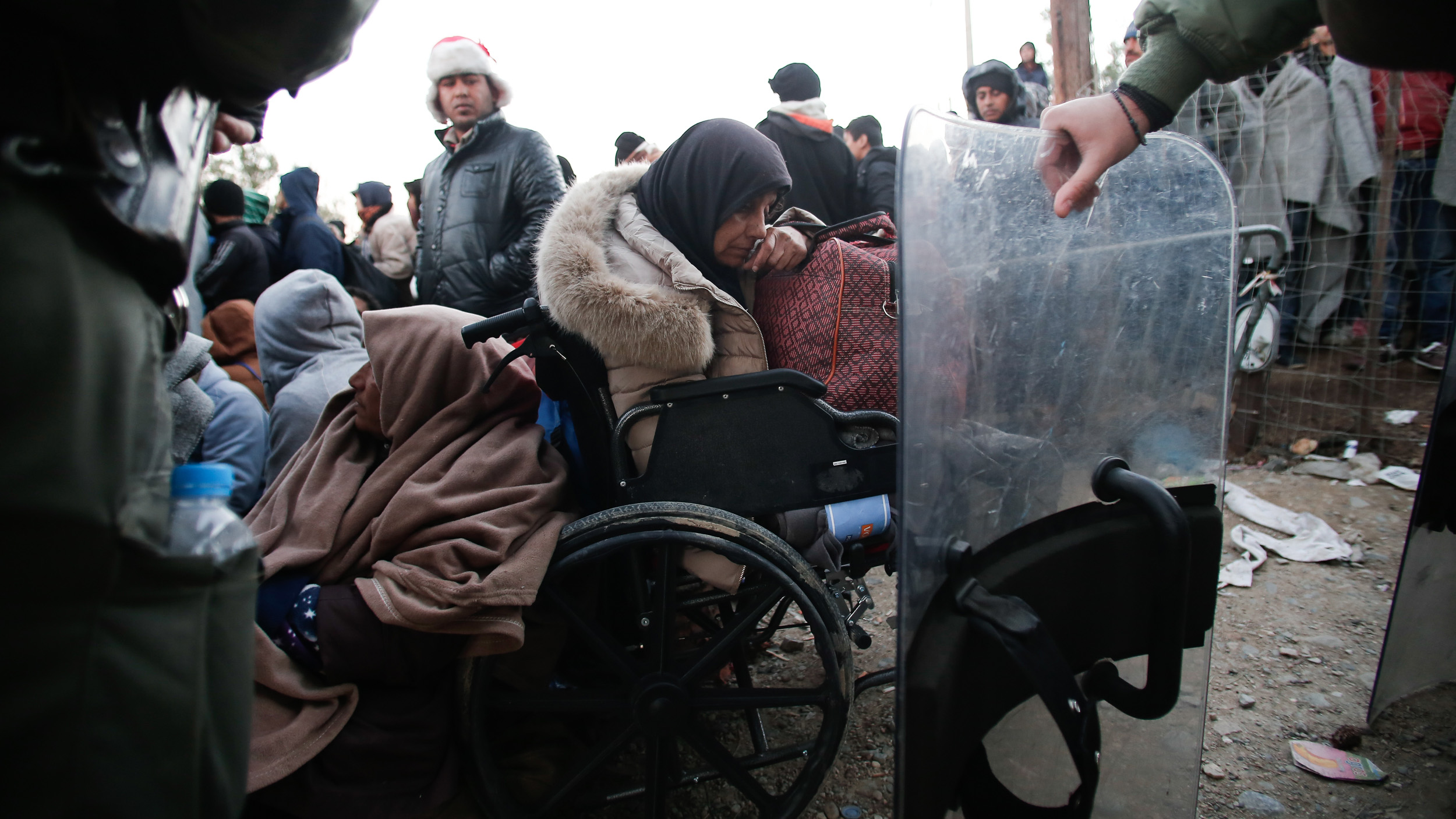 Migrants, even those in wheelchairs, have spent the last two weeks at Greece's border with Macedonia