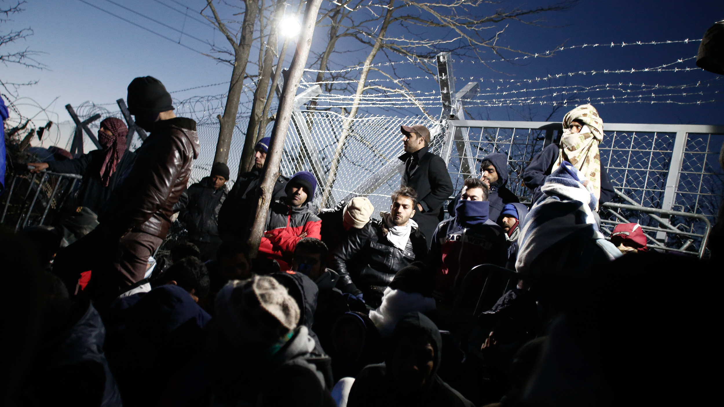 Iranian refugees blocking the border to prevent Syrians, Afghans and Iraqis from crossing