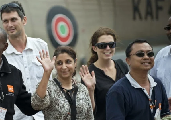 Steve Dennis (back left in white shirt) and colleagues in Nairobi shortly after the end of his hostage ordeal