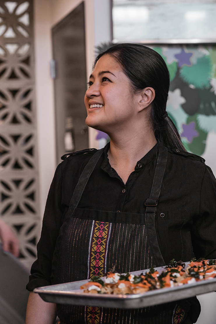 Chera serves guests at a brunch celebrating the opening of Hood Famous Cafe + Bar. Photo by Auriza Ugalino.