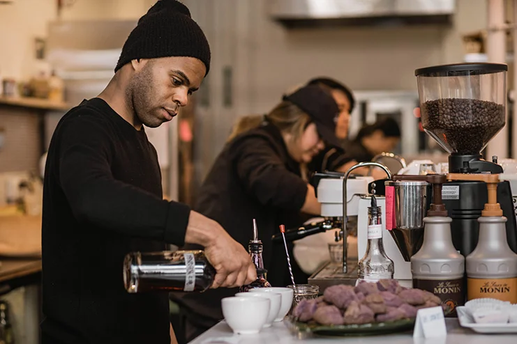 Anton Coleman, lead barista for Hood Famous Cafe + Bar. Photo by Auriza Ugalino.
