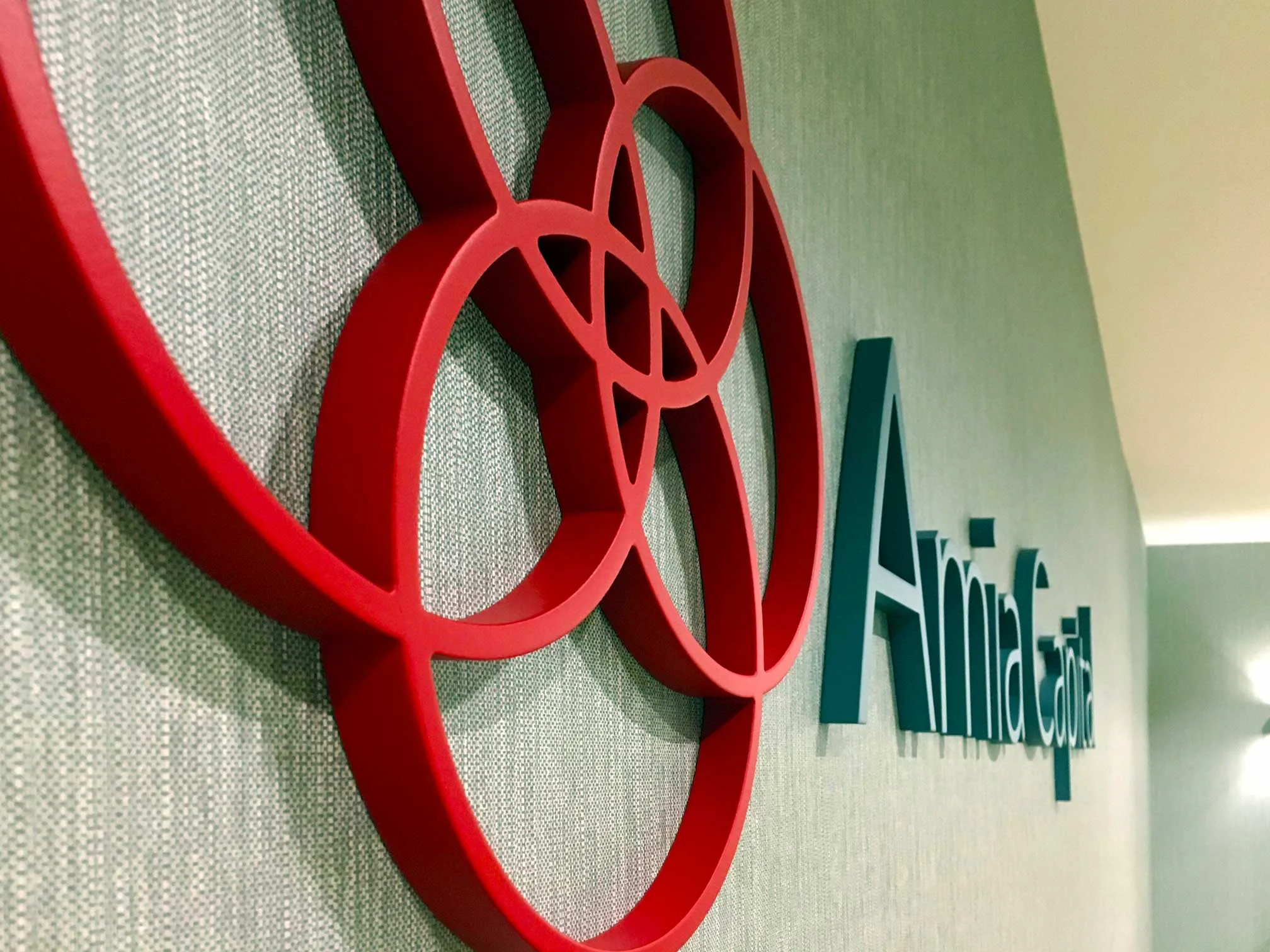Amia Capital raised lettering.