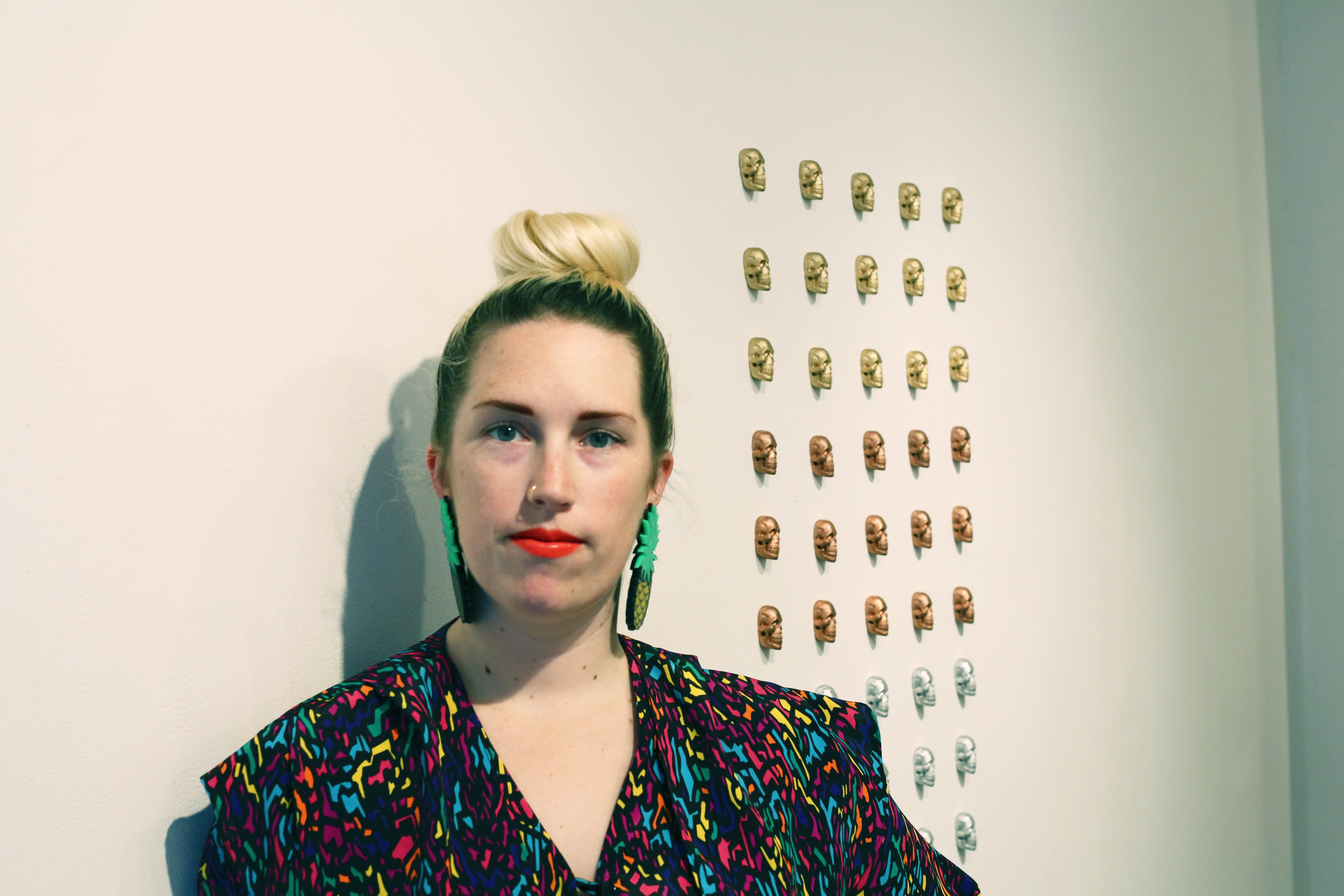 NEW INC Project Manager and curator Alex Darby and her sugar-crafted skulls.
