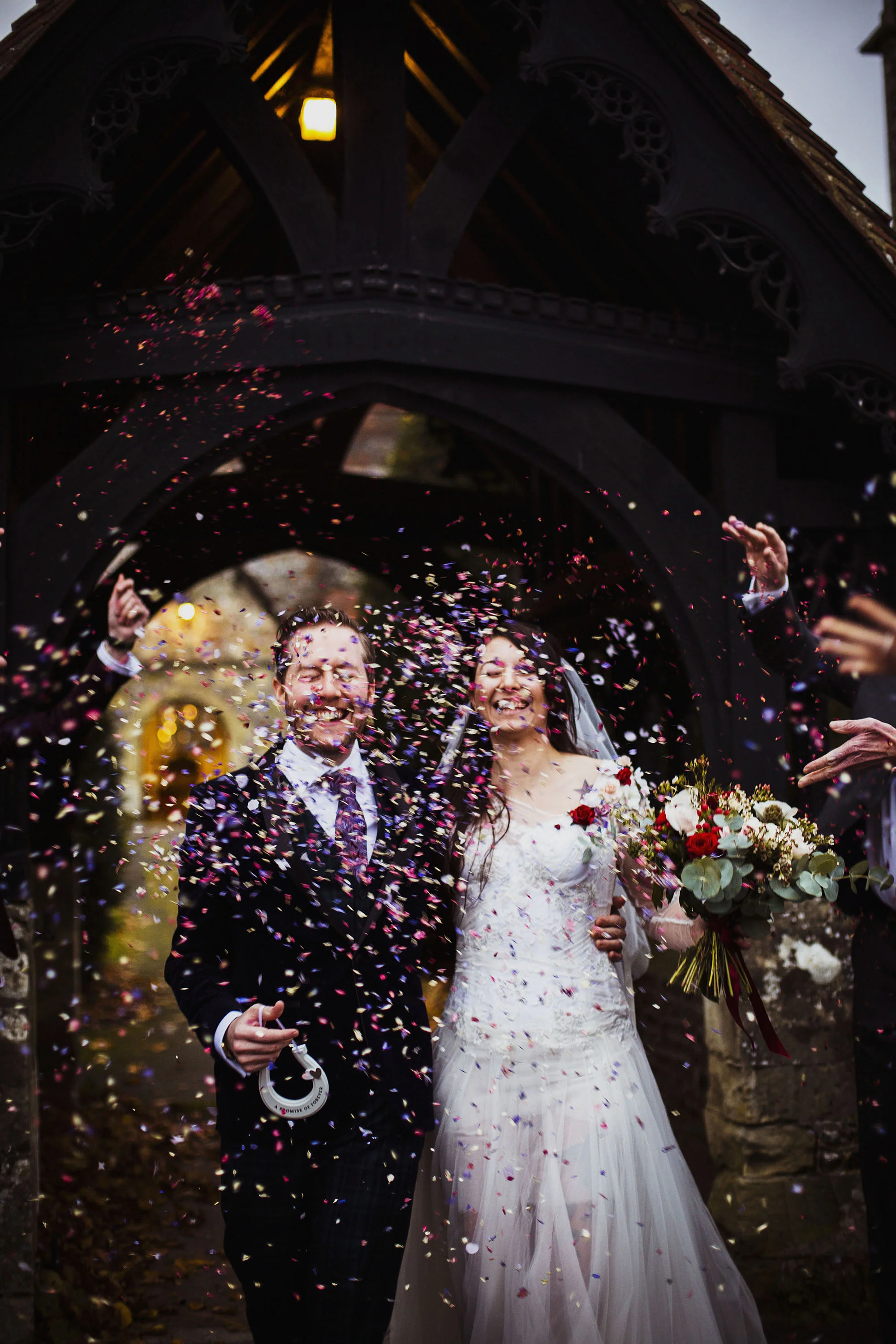 bride and groom confetti photograph outside st laurence church in downtown