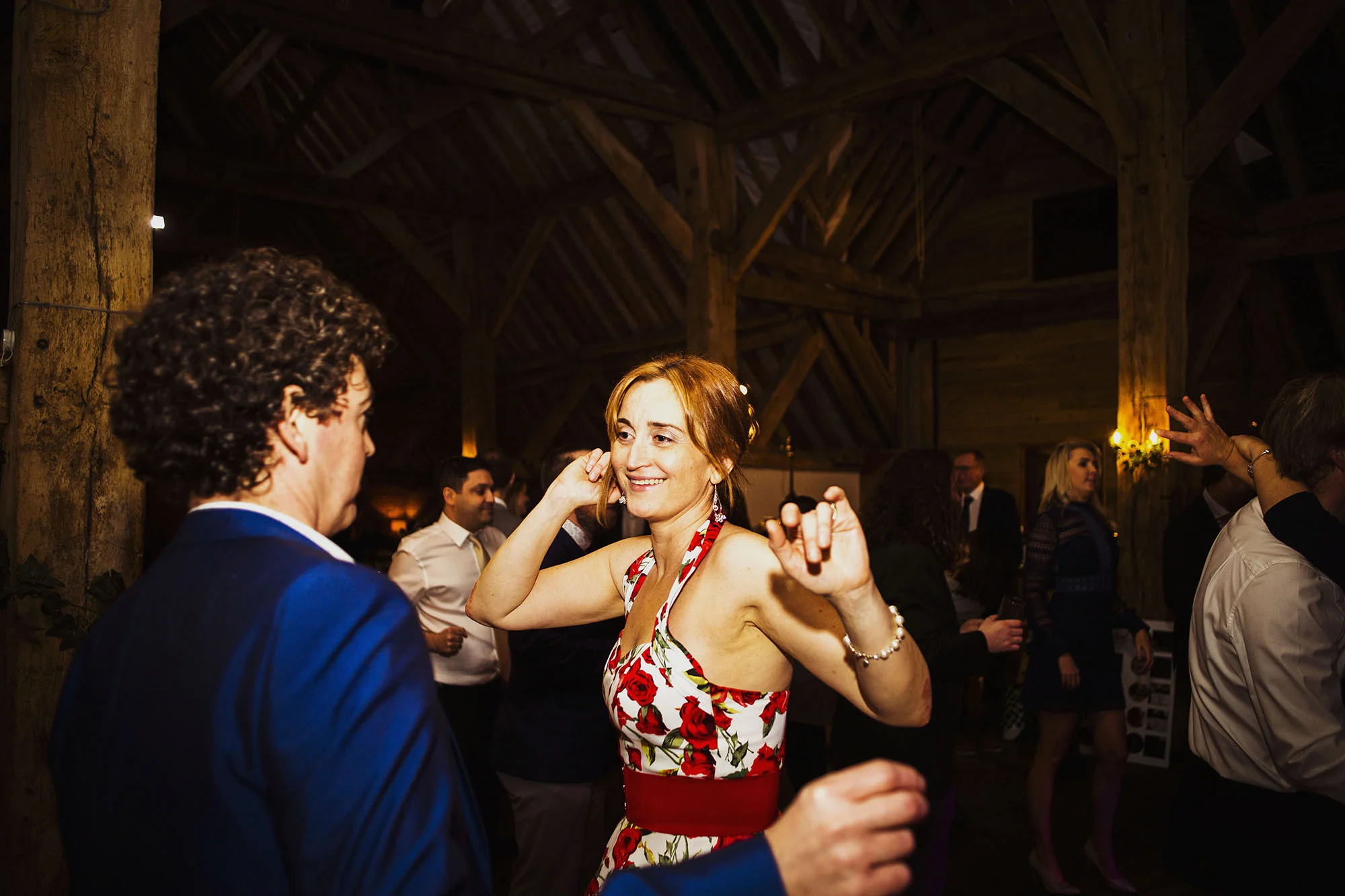 wedding guests dancing at wedding reception at barford park wedding venue in wiltshire