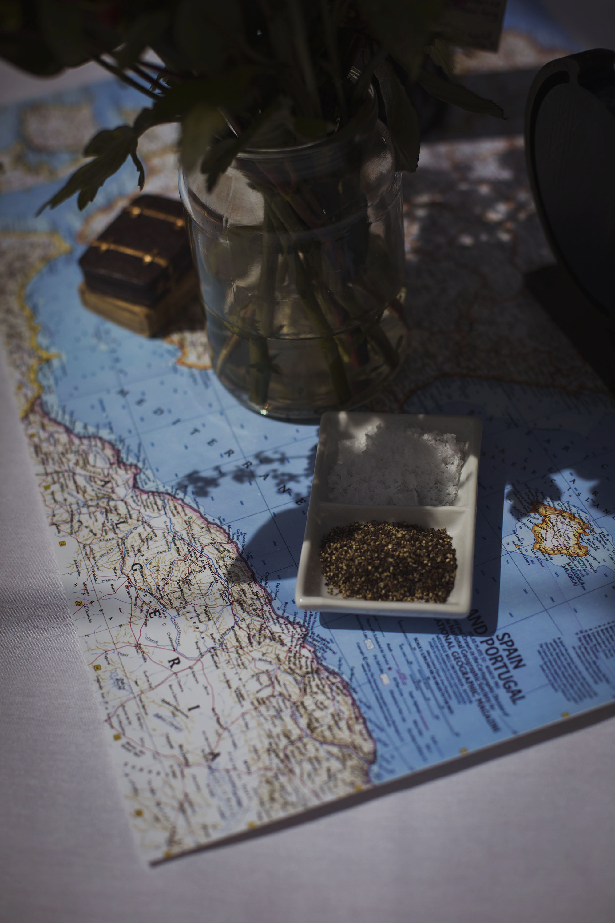 salt and pepper dish on map at wedding breakfast at usk castle 