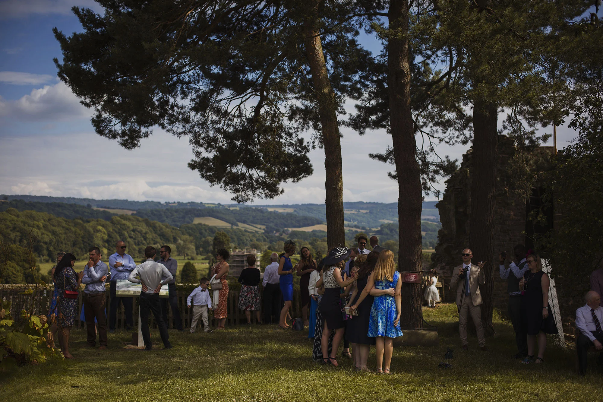 wedding guests mingling at usk castle 