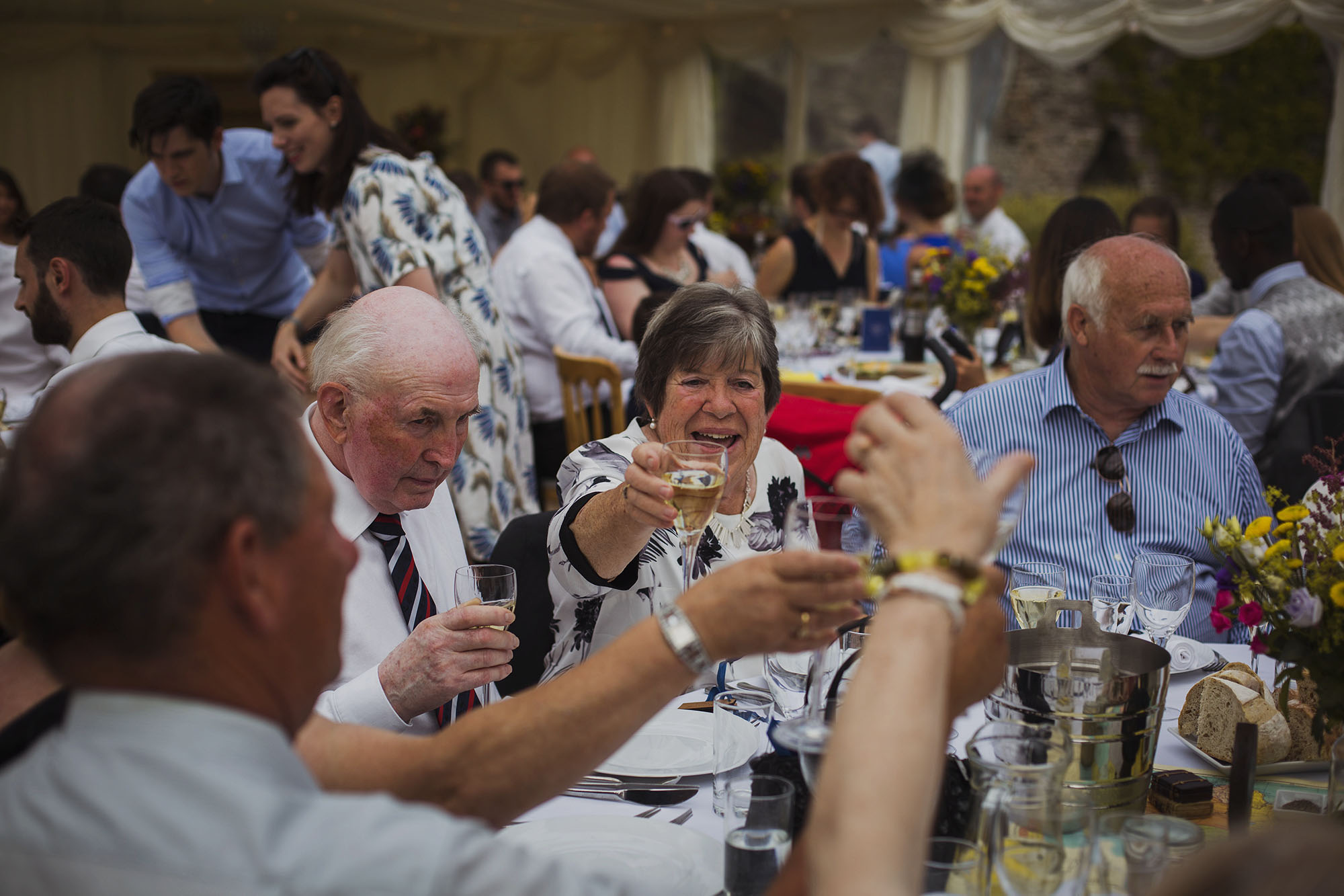 wedding guests cheers at usk castle