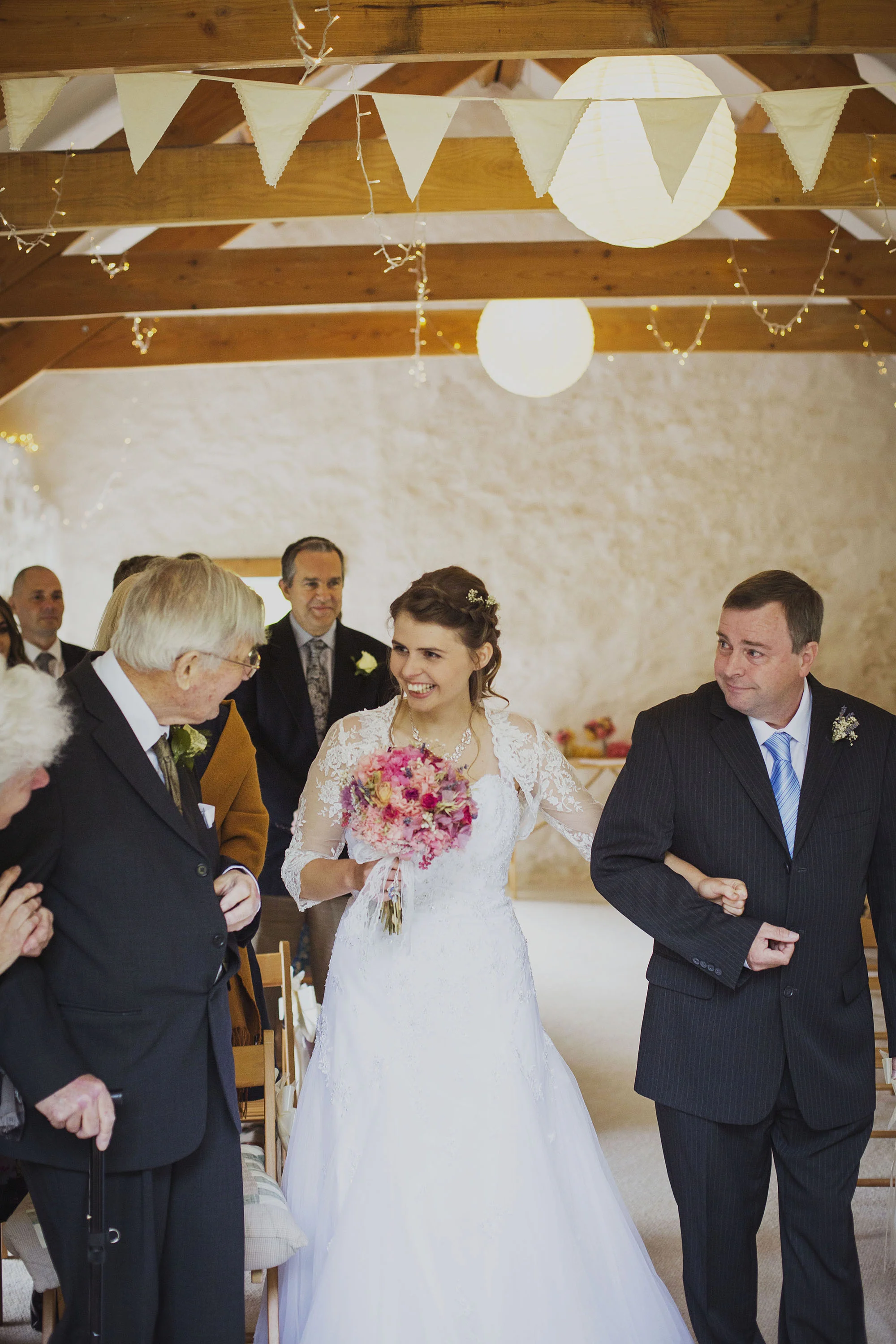 bride greeting groom's father at nantwen wedding venue