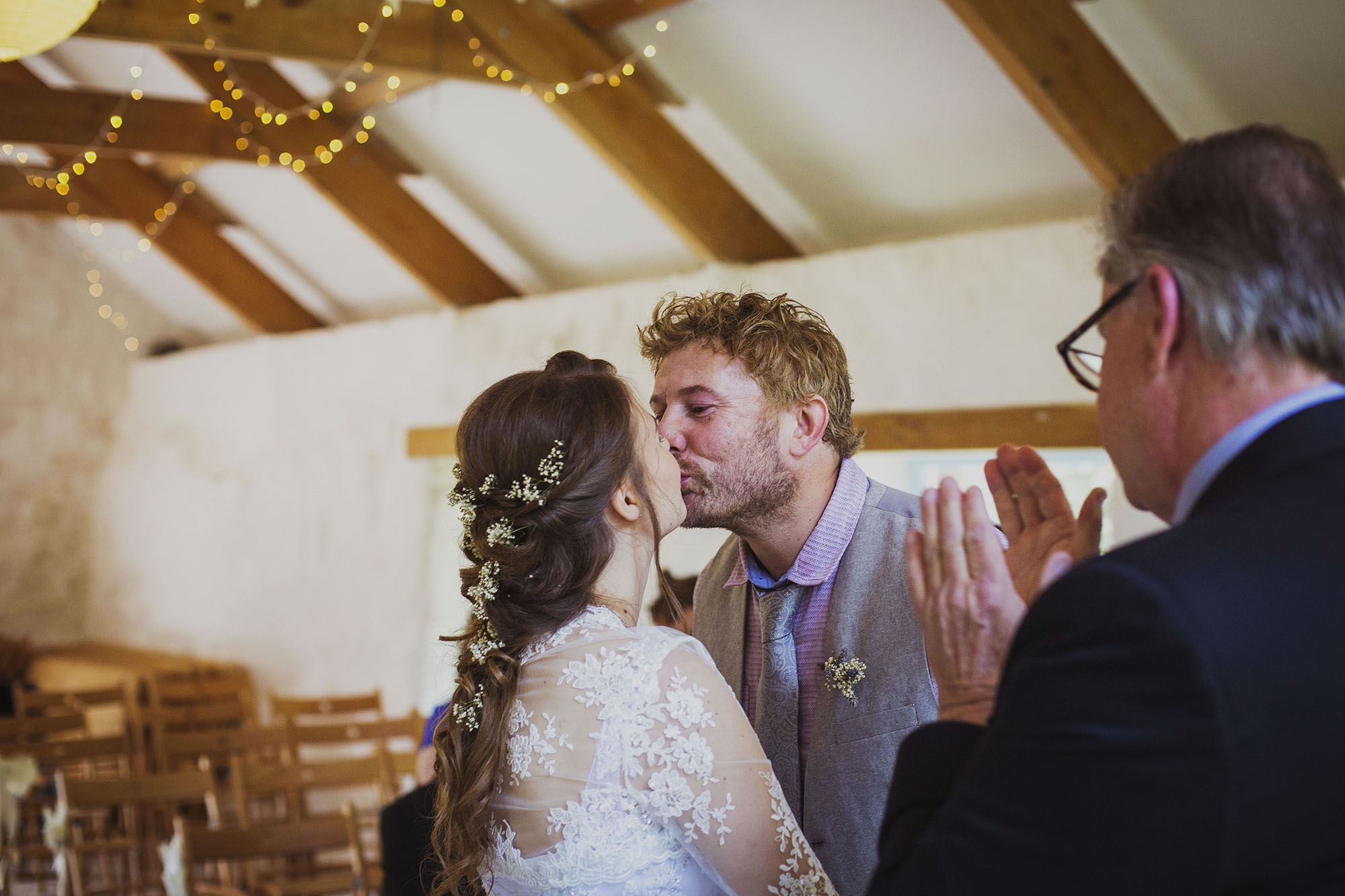 bride and groom first kiss at nantwen wedding venue