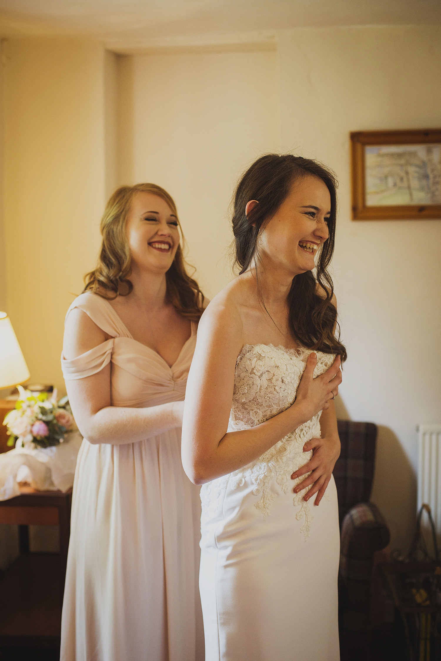 bride getting into dress somerset wedding