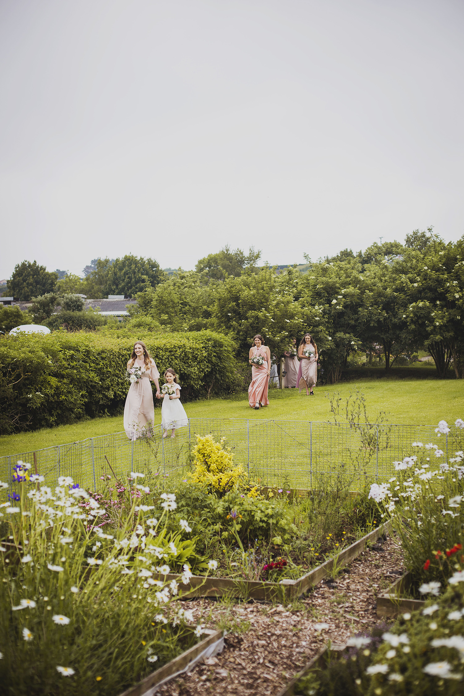 bridesmaids arriving at cott farm barn somerset wedding venue