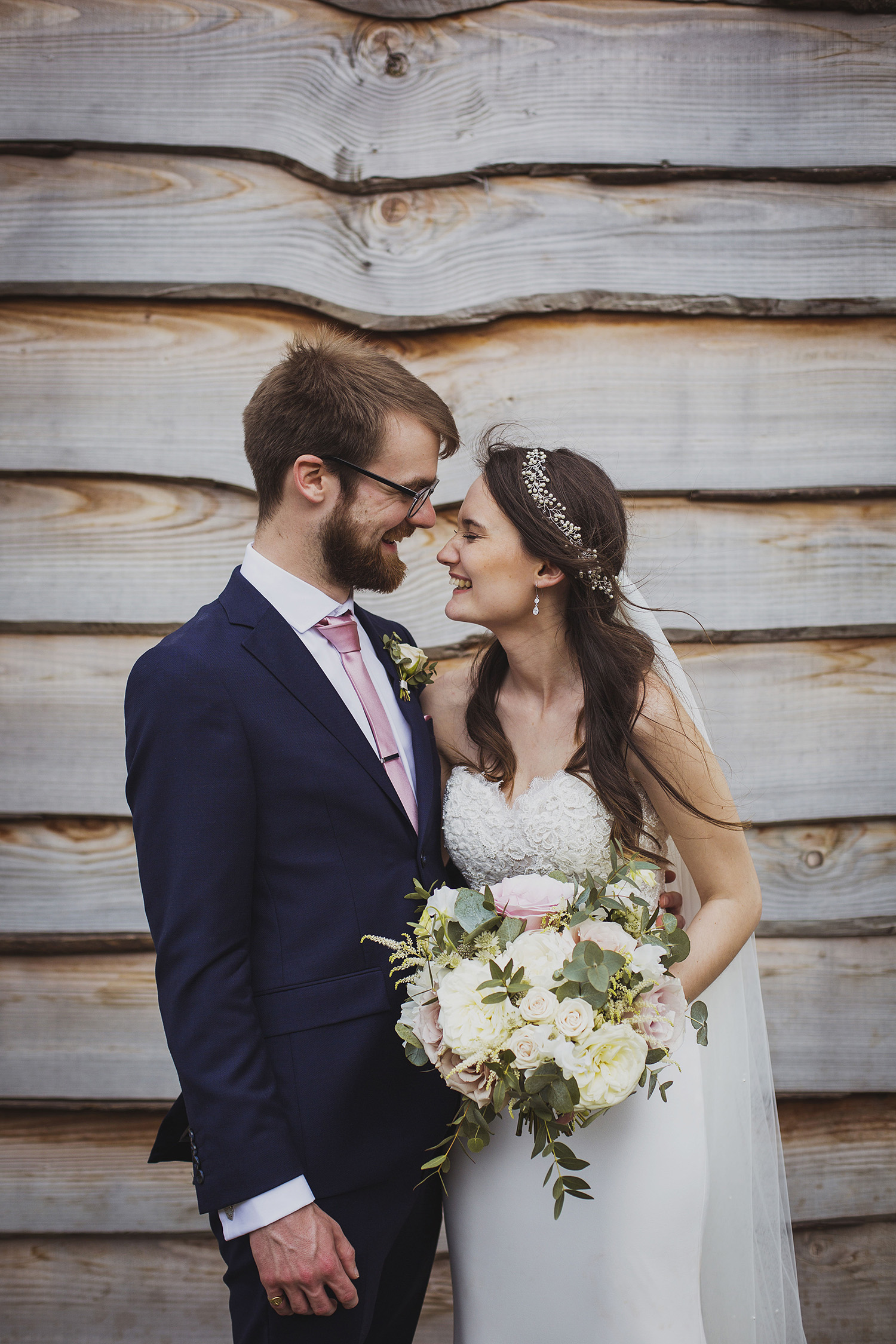 bride and groom portrait at cott farm barn wedding venue somerset