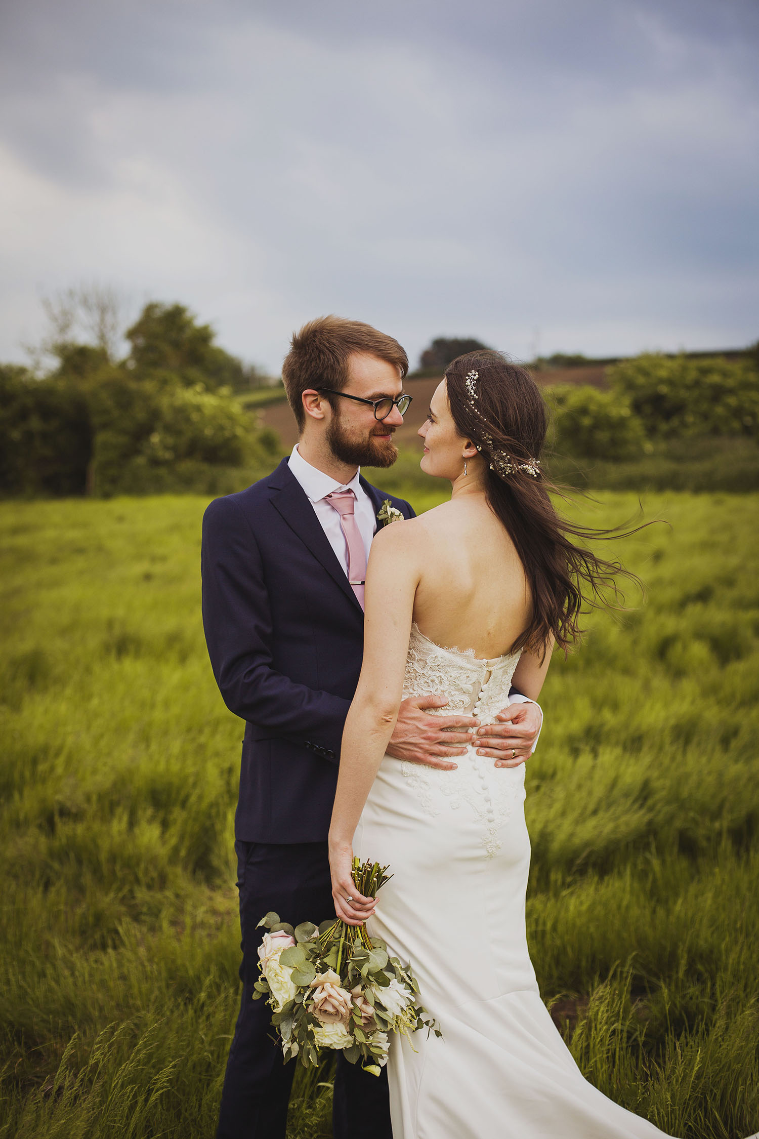 bride and groom portrait at cott farm barn wedding venue somerset 